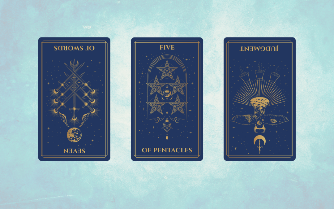 A tarot card spread featuring three cards on a light blue textured background. The cards, with intricate gold designs on deep blue backgrounds, include the reversed "Seven of Swords" on the left, the "Five of Pentacles" in the center, and the reversed "Judgment" on the right. Each card features detailed artwork with celestial and symbolic elements, giving the scene a mystical and introspective feel.